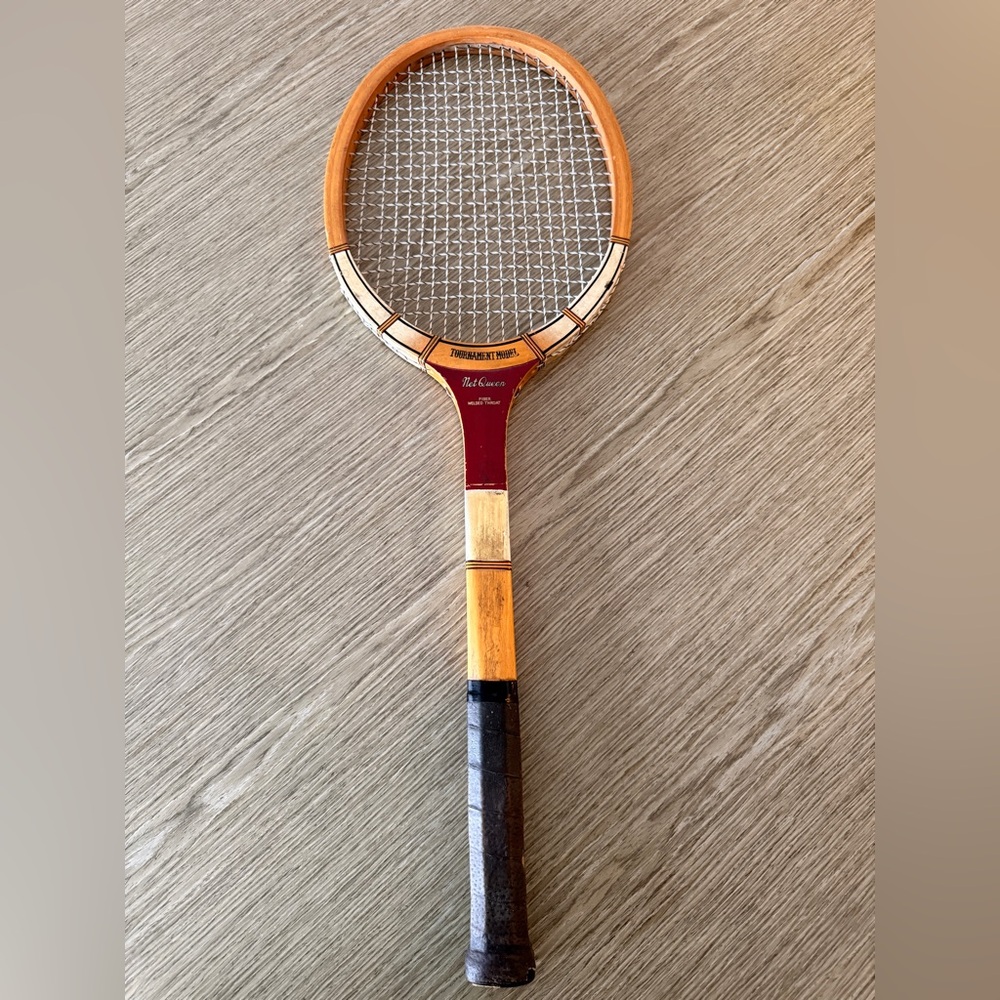 Vintage Wooden Tennis Racket with Red and Brown Accents